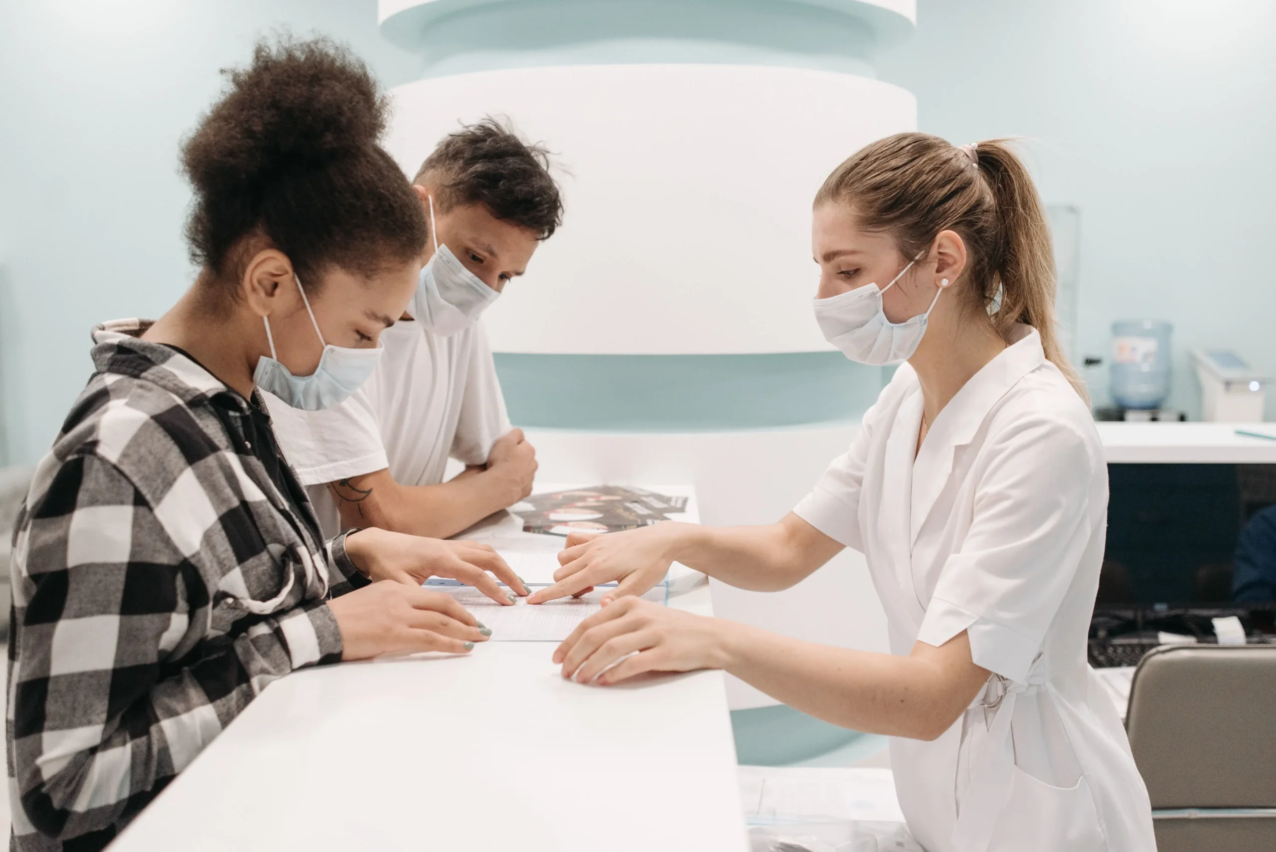 Healthcare professional assisting a patient with onboarding