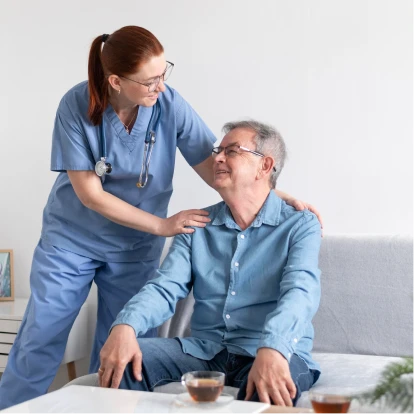 Healthcare professional assisting an elderly patient