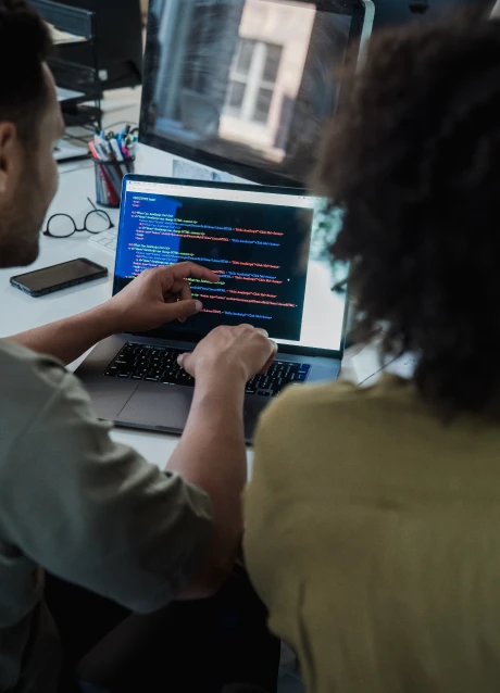 Developer working on software used to modernize a manufacturing system