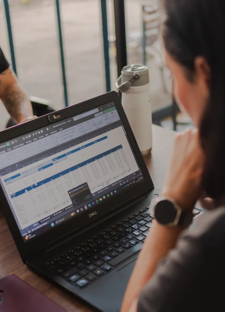 Developer working on a software application on a laptop