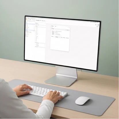Person working on a software application at a desktop computer