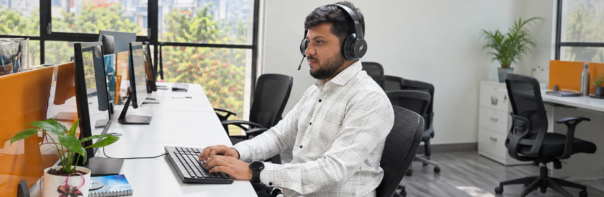 Professionals working on computers in an office