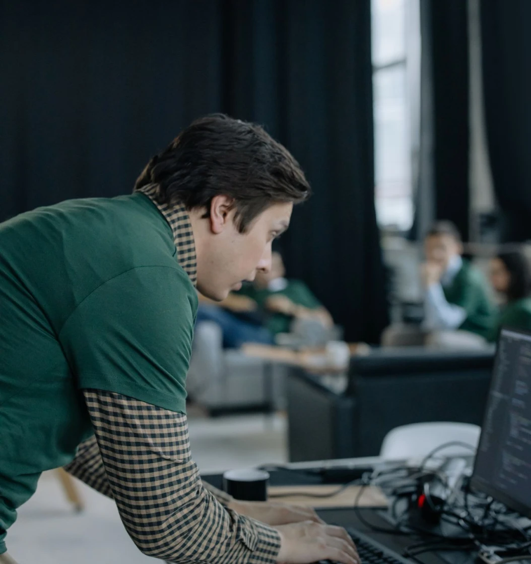 Professional working on software at a computer