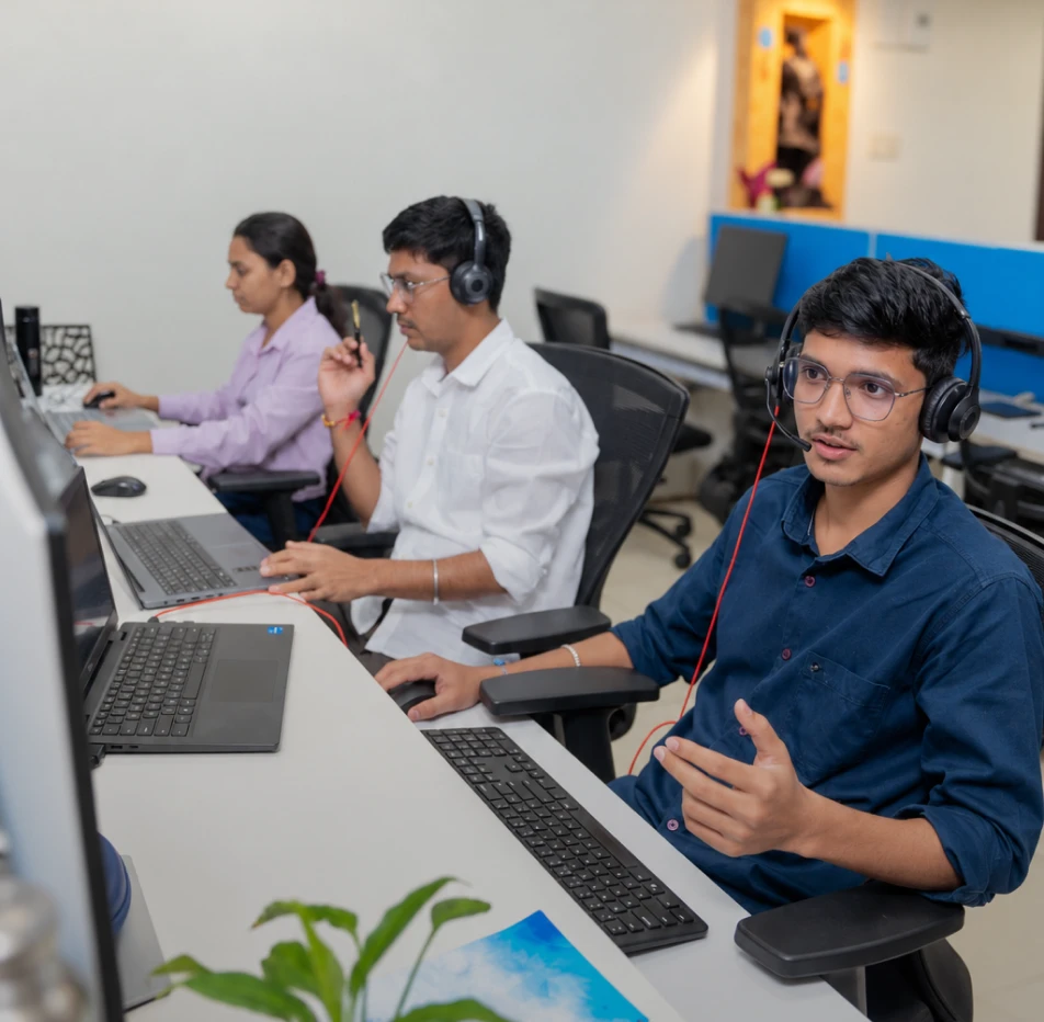 Development team members working together at computers