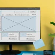 Software interface wireframe displayed on a laptop
